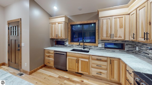 108 Rolling Oak Ln, Roscommon, MI 48653 - kitchen featuring a sink, light wood finished floors, dishwasher, light brown cabinets, and decorative backsplash