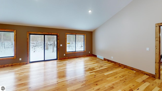 108 Rolling Oak Ln, Roscommon, MI 48653 - empty room with light wood-style flooring, baseboards, and visible vents