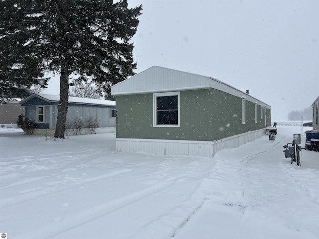 view of snow covered exterior