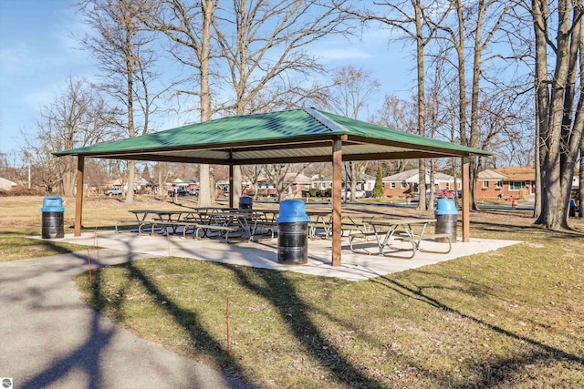 view of home's community with a gazebo and a yard