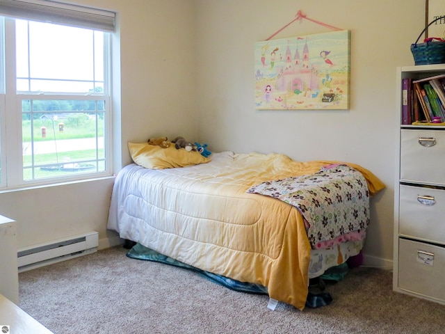 carpeted bedroom featuring a baseboard radiator