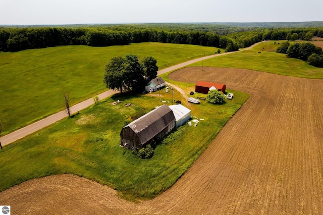 birds eye view of property featuring a rural view