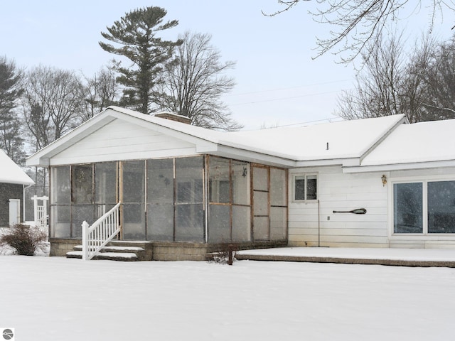 exterior space with a sunroom