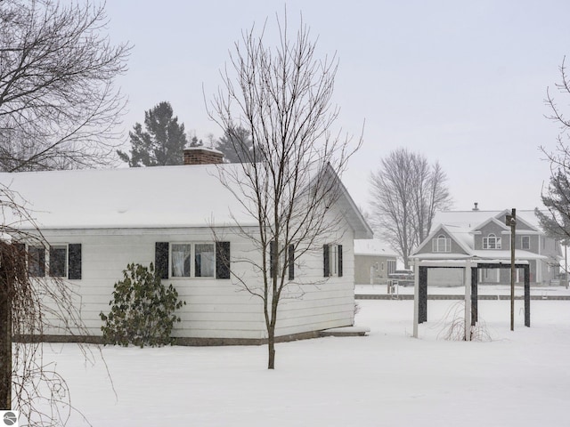 view of snow covered exterior