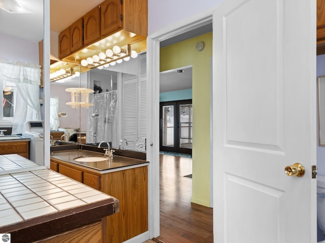 bathroom featuring hardwood / wood-style floors and sink