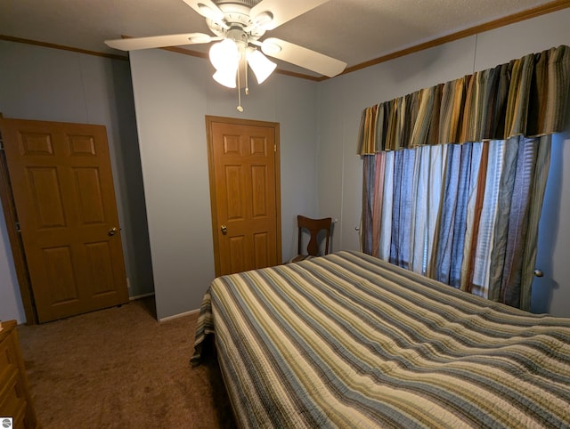 bedroom with carpet flooring, ceiling fan, and crown molding