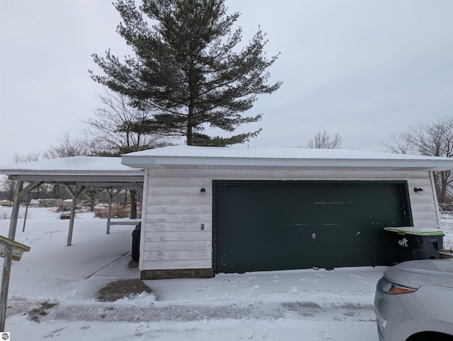 view of snow covered garage