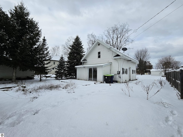 view of snow covered property