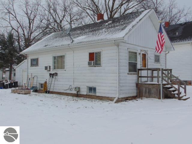 view of snow covered property