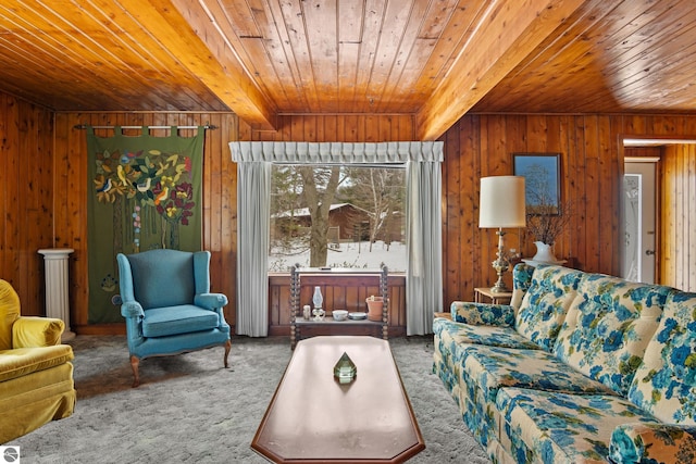 living room featuring carpet, wood ceiling, beamed ceiling, and wood walls