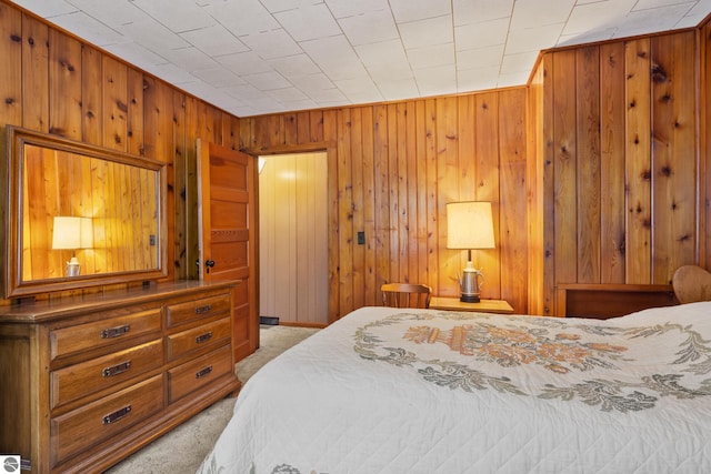 bedroom featuring light carpet