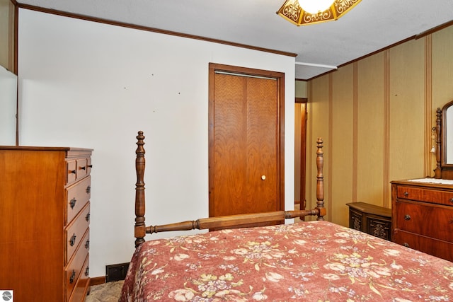 bedroom with ornamental molding