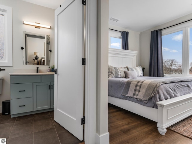 bedroom with sink