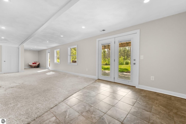 interior space featuring light colored carpet