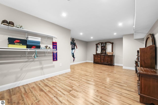 sitting room featuring light wood-type flooring