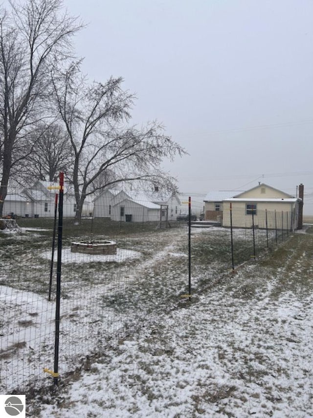 view of yard covered in snow