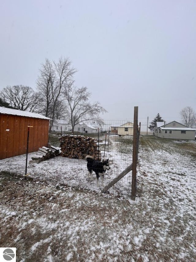 view of snowy yard