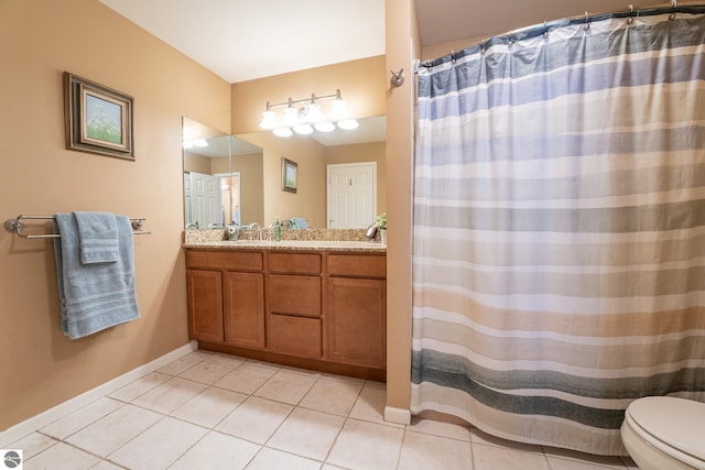 bathroom featuring tile patterned floors, a shower with curtain, vanity, and toilet