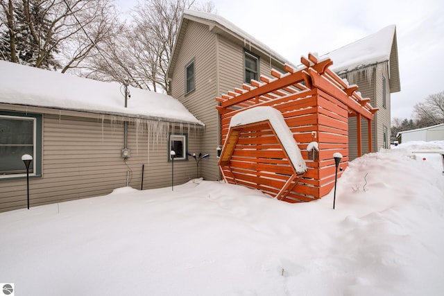 view of snow covered property