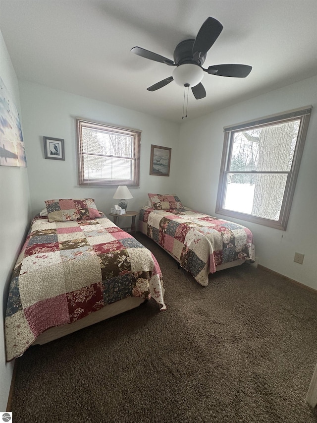 bedroom featuring ceiling fan and carpet floors