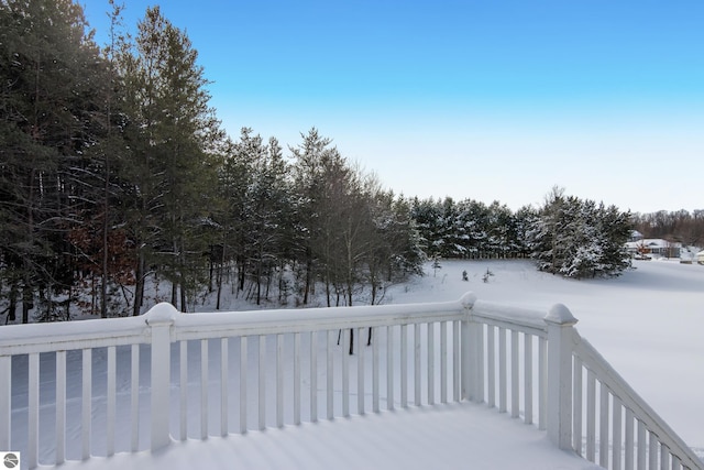 view of snow covered deck