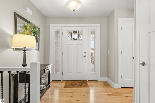 entrance foyer with light hardwood / wood-style floors