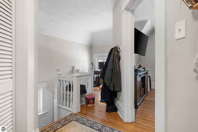 interior space featuring vaulted ceiling and hardwood / wood-style floors