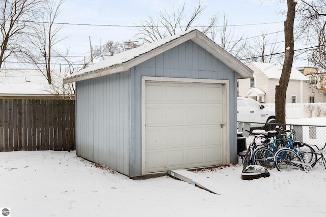 view of snow covered garage