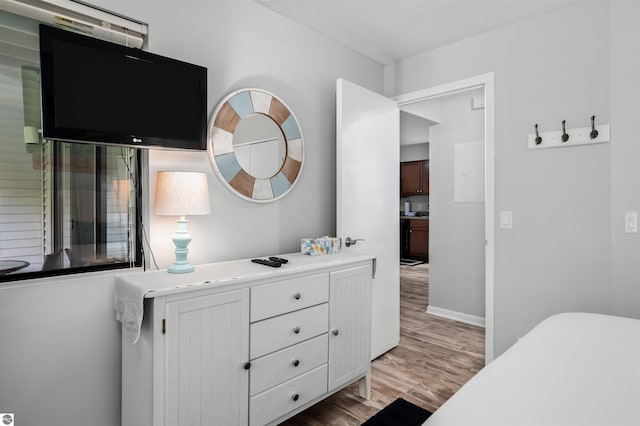 bedroom featuring light wood-type flooring