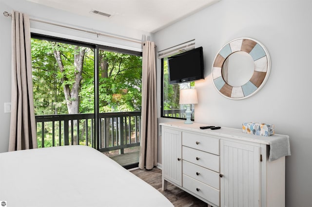 bedroom featuring dark hardwood / wood-style floors