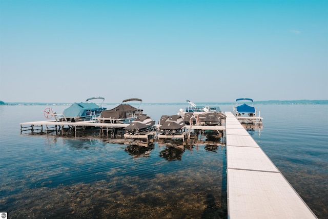 view of dock with a water view