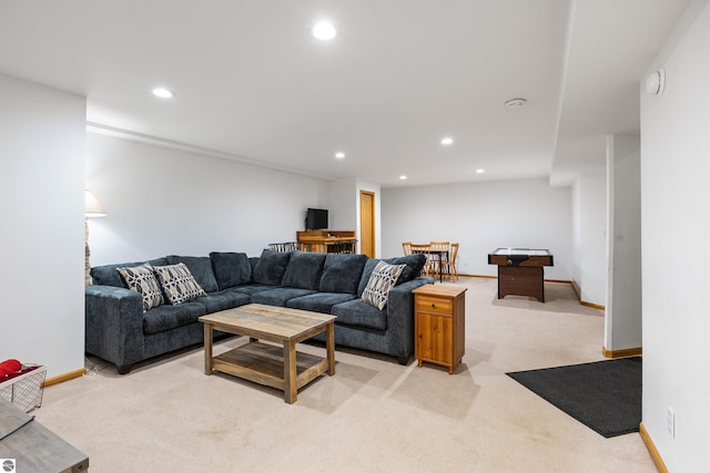 living room featuring light carpet