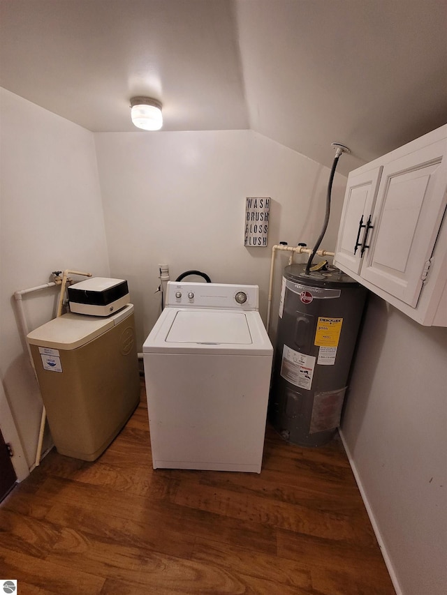 clothes washing area featuring electric water heater, cabinets, and dark wood-type flooring