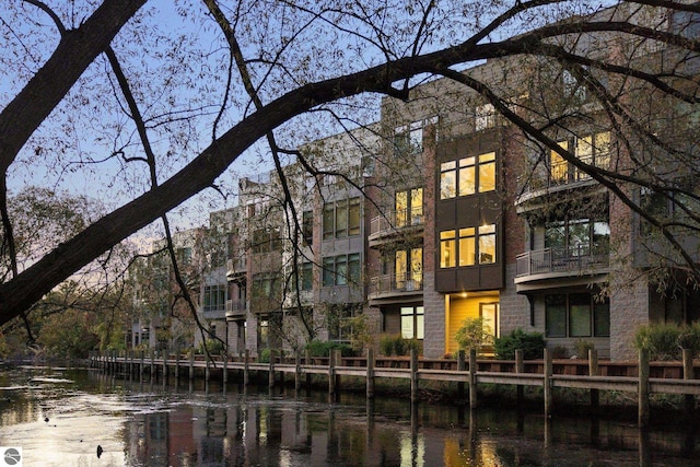 view of building exterior with a water view