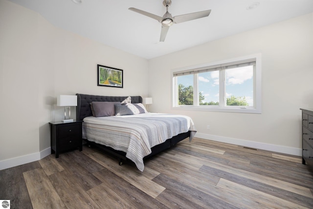 bedroom featuring ceiling fan and wood-type flooring