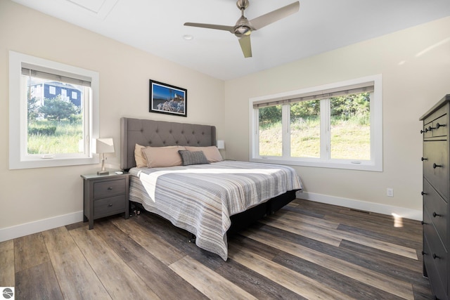 bedroom featuring ceiling fan and hardwood / wood-style flooring