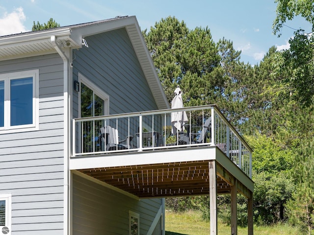 view of property exterior featuring a deck