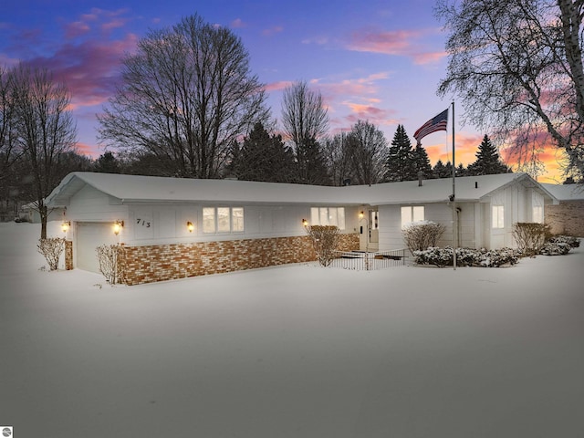 single story home featuring a garage