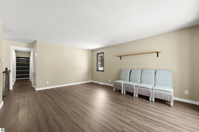 unfurnished room with hardwood / wood-style flooring