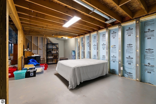 bedroom with concrete flooring