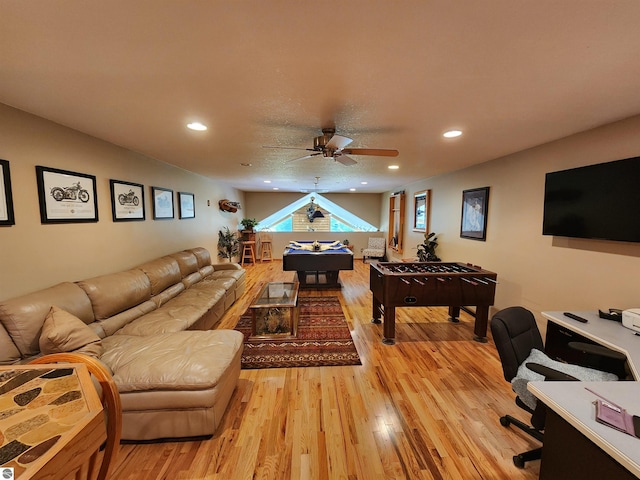 playroom featuring light wood-type flooring and ceiling fan