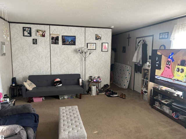 living room featuring ornamental molding, carpet floors, and a textured ceiling