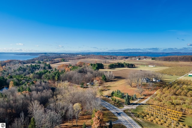 aerial view with a water view and a rural view