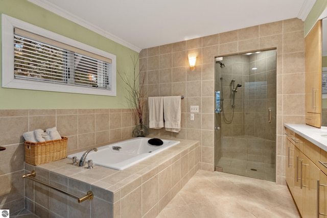 bathroom featuring ornamental molding, plus walk in shower, tile patterned floors, and vanity