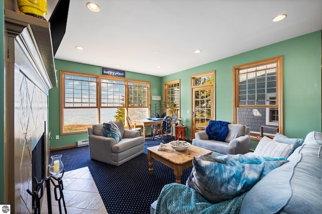 living room featuring a baseboard heating unit