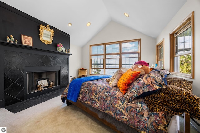 carpeted bedroom featuring vaulted ceiling