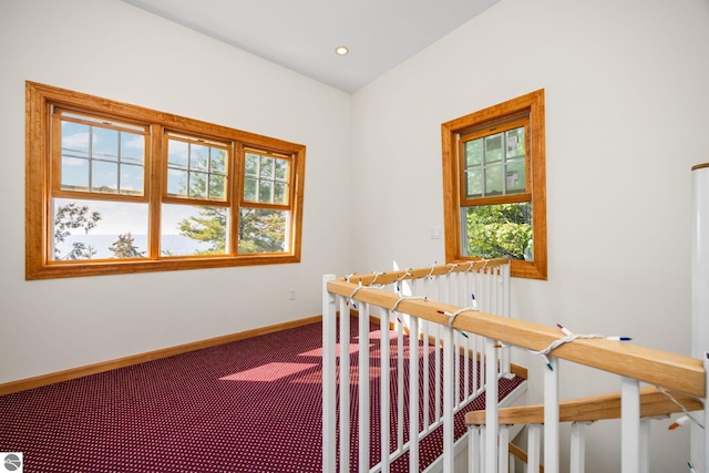 corridor featuring carpet floors