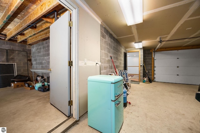 garage featuring refrigerator