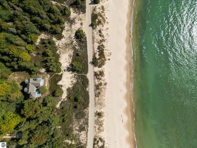 aerial view with a beach view and a water view