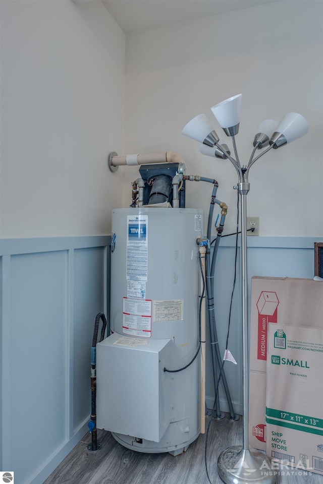 utility room with water heater